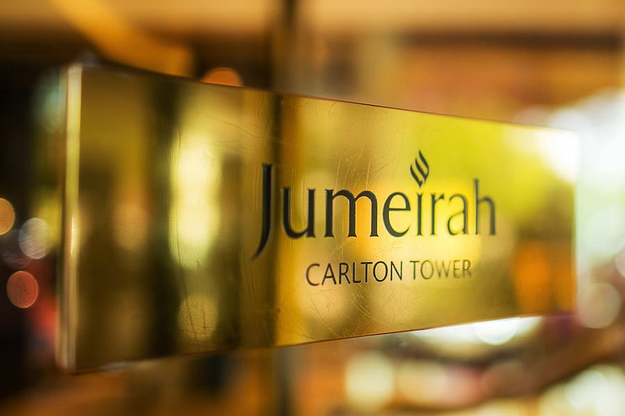 jumeirah carlton towers, exterior sign, asian wedding photography